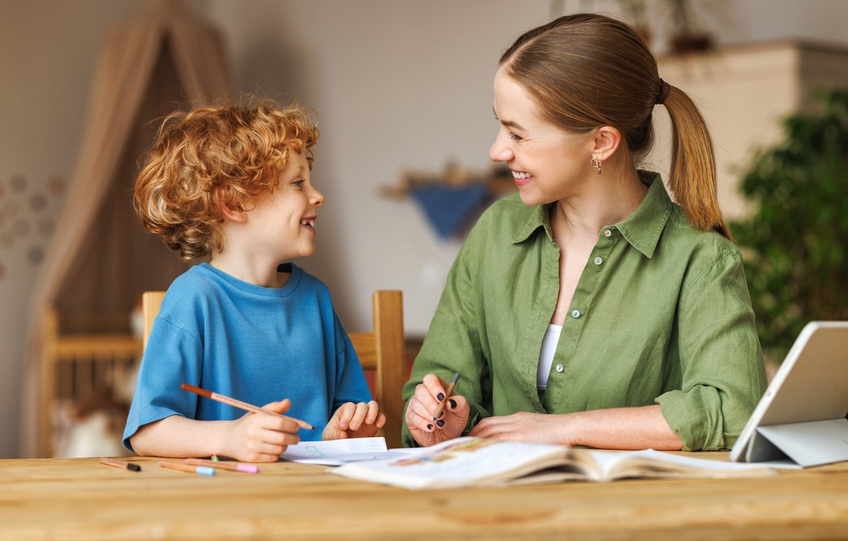 Parent helping child with homework