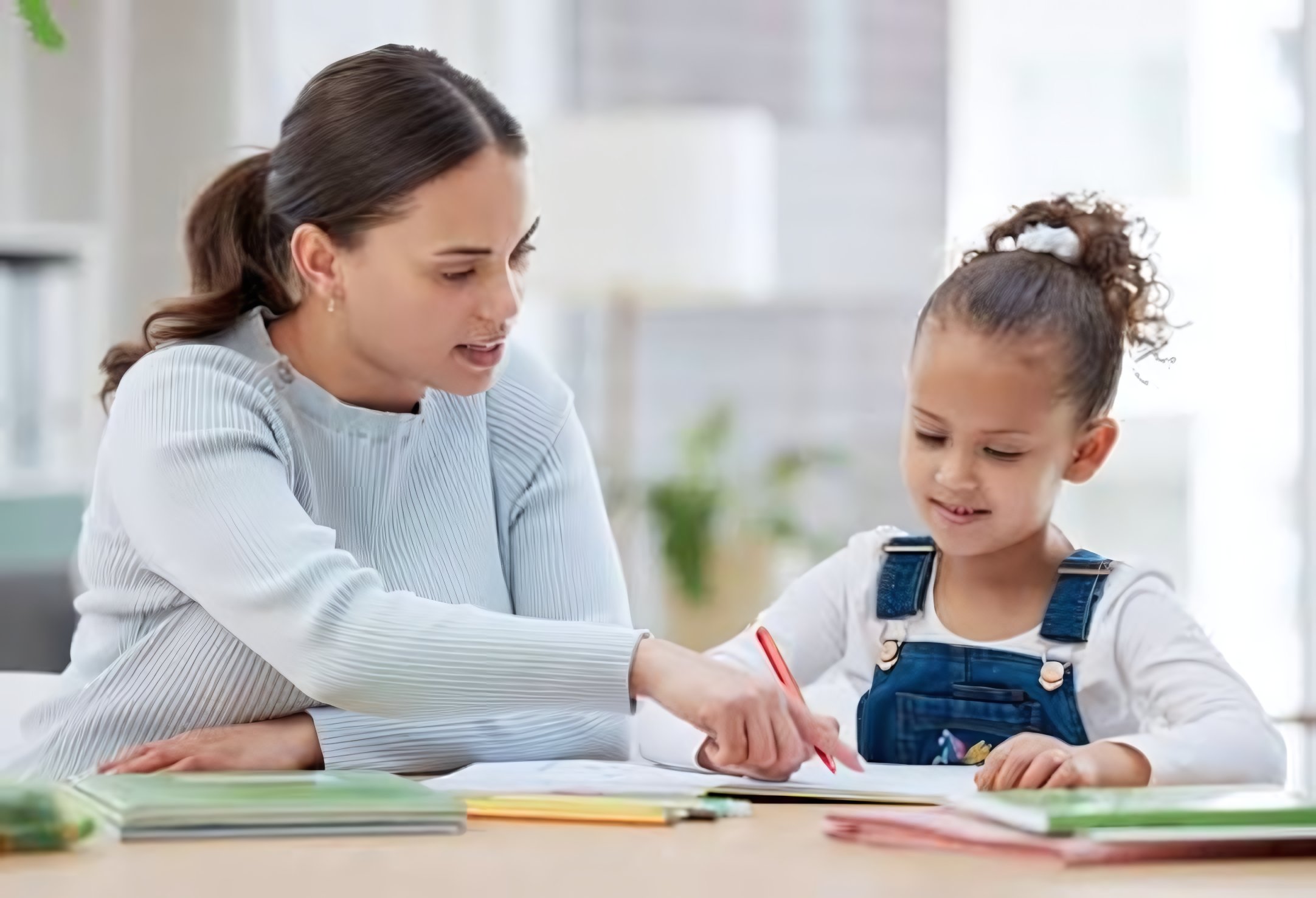 Parent helping child with homework